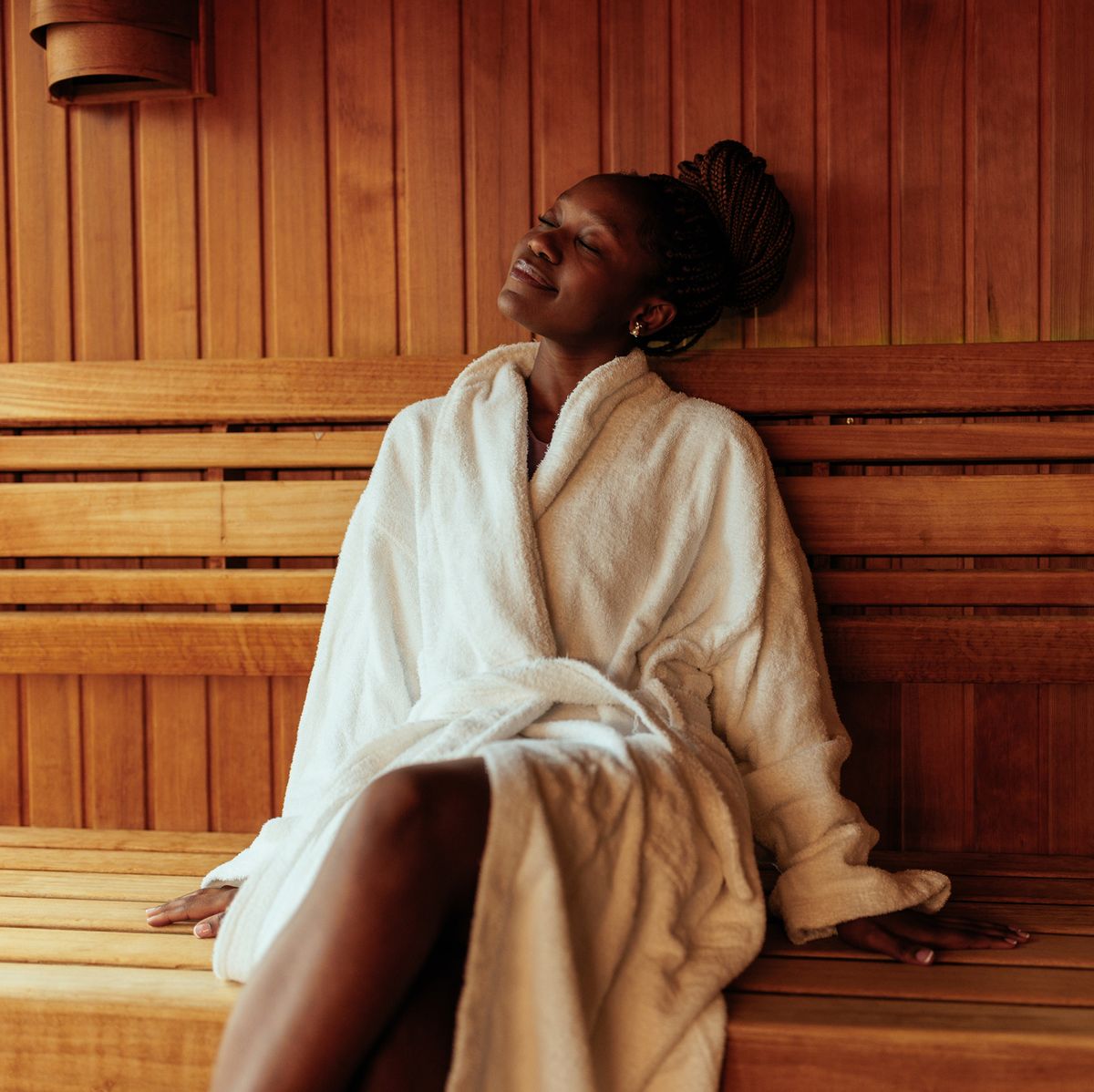 young-black-woman-enjoying-in-sauna-royalty-free-image-1707761078.jpg